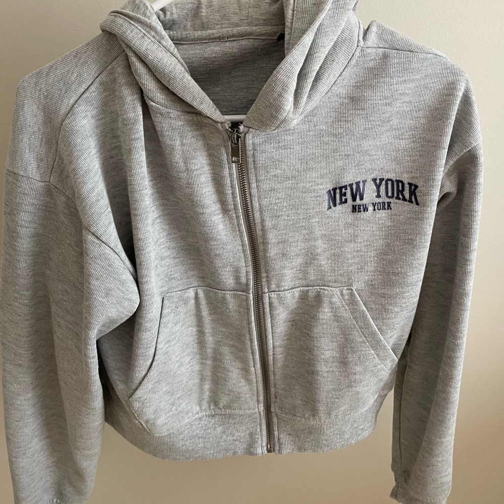 new york cropped zip up